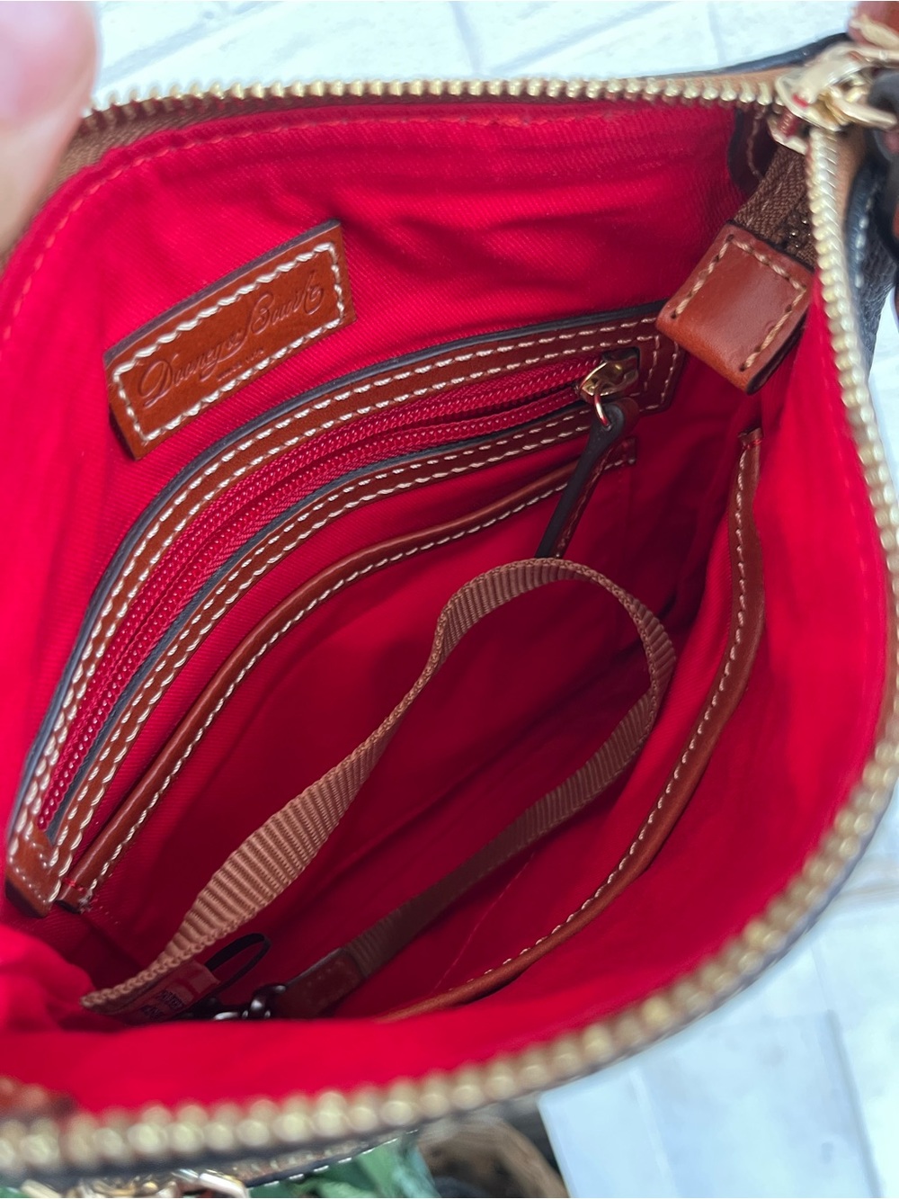Dooney & Bourke black leather letter carrier crossbody purse, brown leather trim - Picture 10 of 12